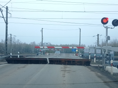 Железнодорожный переезд со шлагбаумом